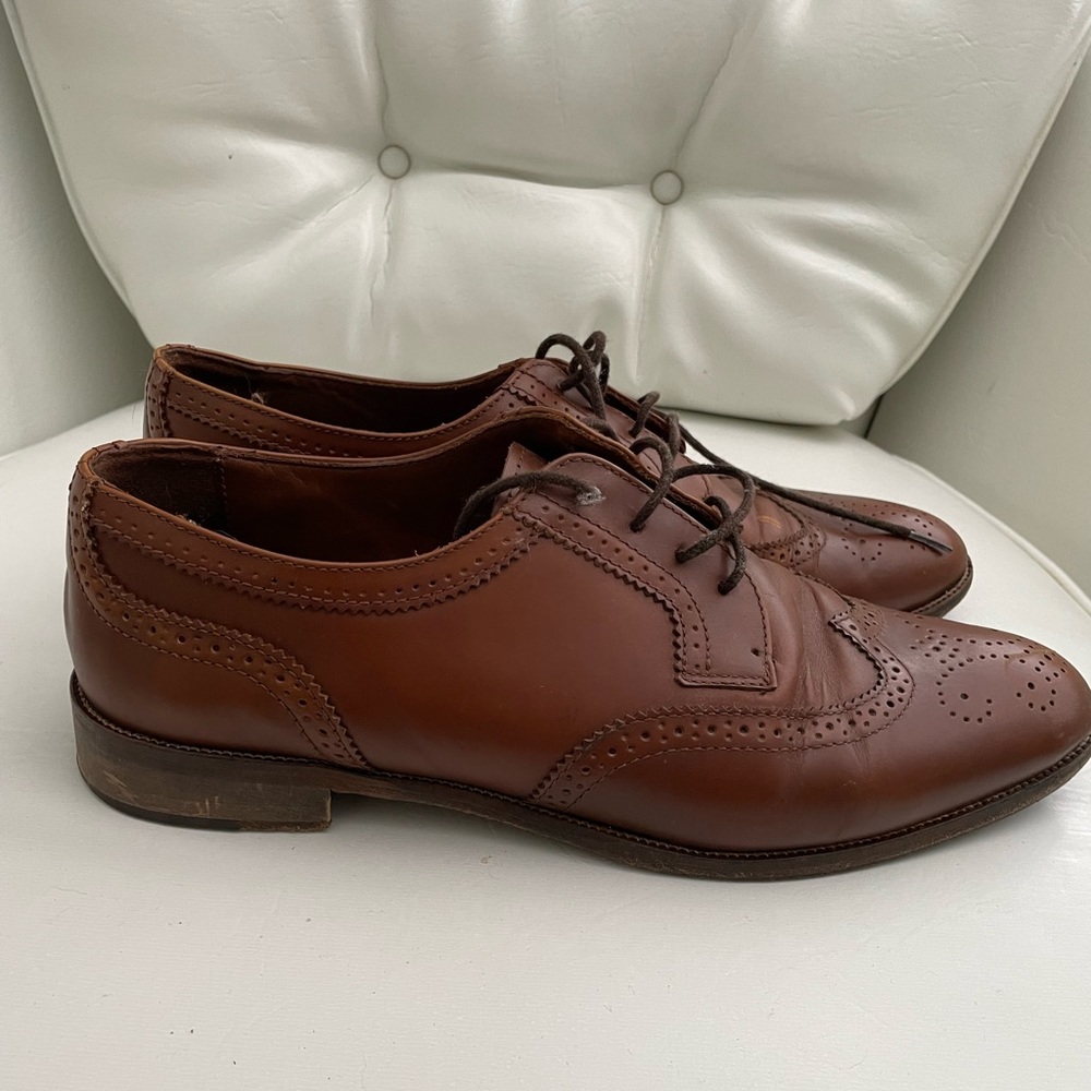 Brown leather shoes in good condition.